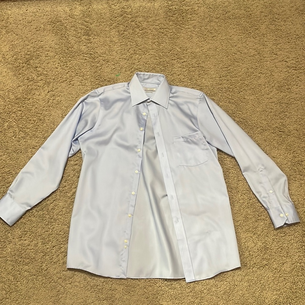 Blue dress shirt in good condition. I am selling because i do not wear it often.